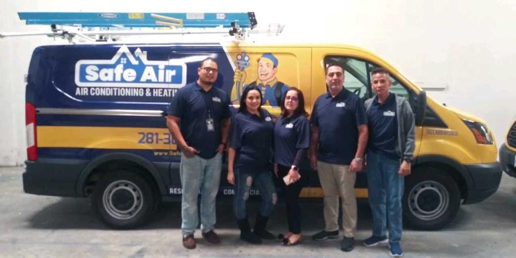 The Safe Air LLC team in front of a Safe Air service van